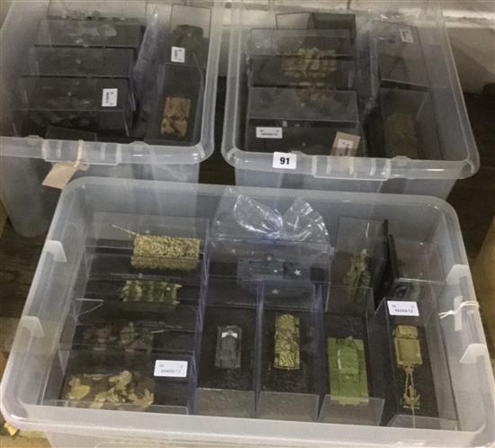 Approx 60 Deagostini, etc combat tanks/armoured vehicles in plastic display cases